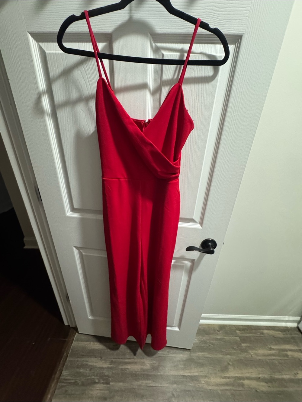 Red Sleeveless Womenโs junpsuit/romper with Draped Bodice